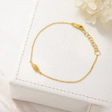 MIDSUMMER STAR BRACELET - SPIRAL SHELL BRACELET GOLD