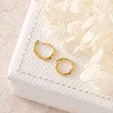 MIDSUMMER STAR EARRINGS -DELICATE ROUND HUGGIES 18K GOLD